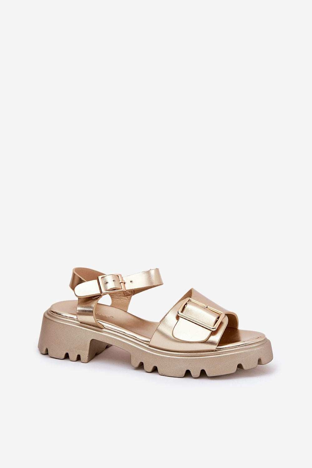 Talmera buckled platform sandals in gold, with eco leather finish and minimalist flat sole, ideal for warm weather styling.