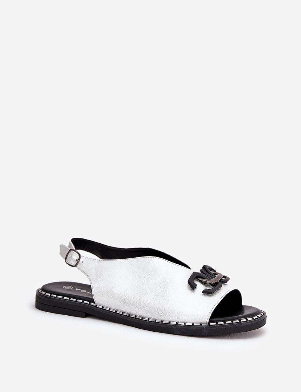Almira Flat Eco-Leather Sandals with decorative front detail and adjustable buckle strap, ideal for summer wear with dresses or trousers.