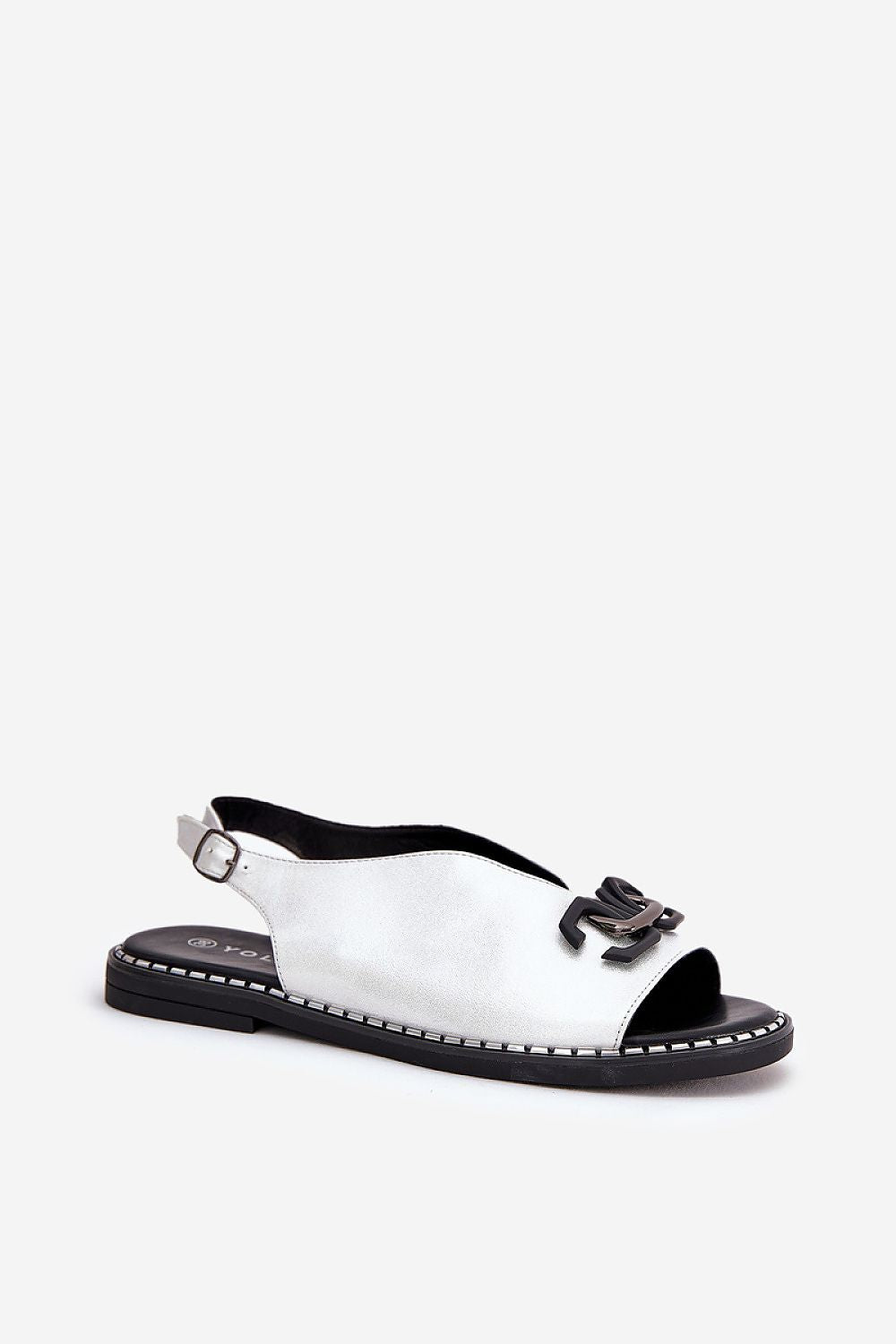 Almira Flat Eco-Leather Sandals with decorative front detail and adjustable buckle strap, ideal for summer wear with dresses or trousers.