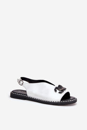 Almira Flat Eco-Leather Sandals with decorative front detail and adjustable buckle strap, ideal for summer wear with dresses or trousers.