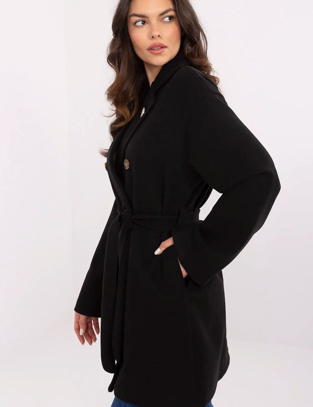 Selvarinne Double-Breasted Short Coat with waist tie and decorative brooch, perfect for transitional wear. Model wearing black coat.