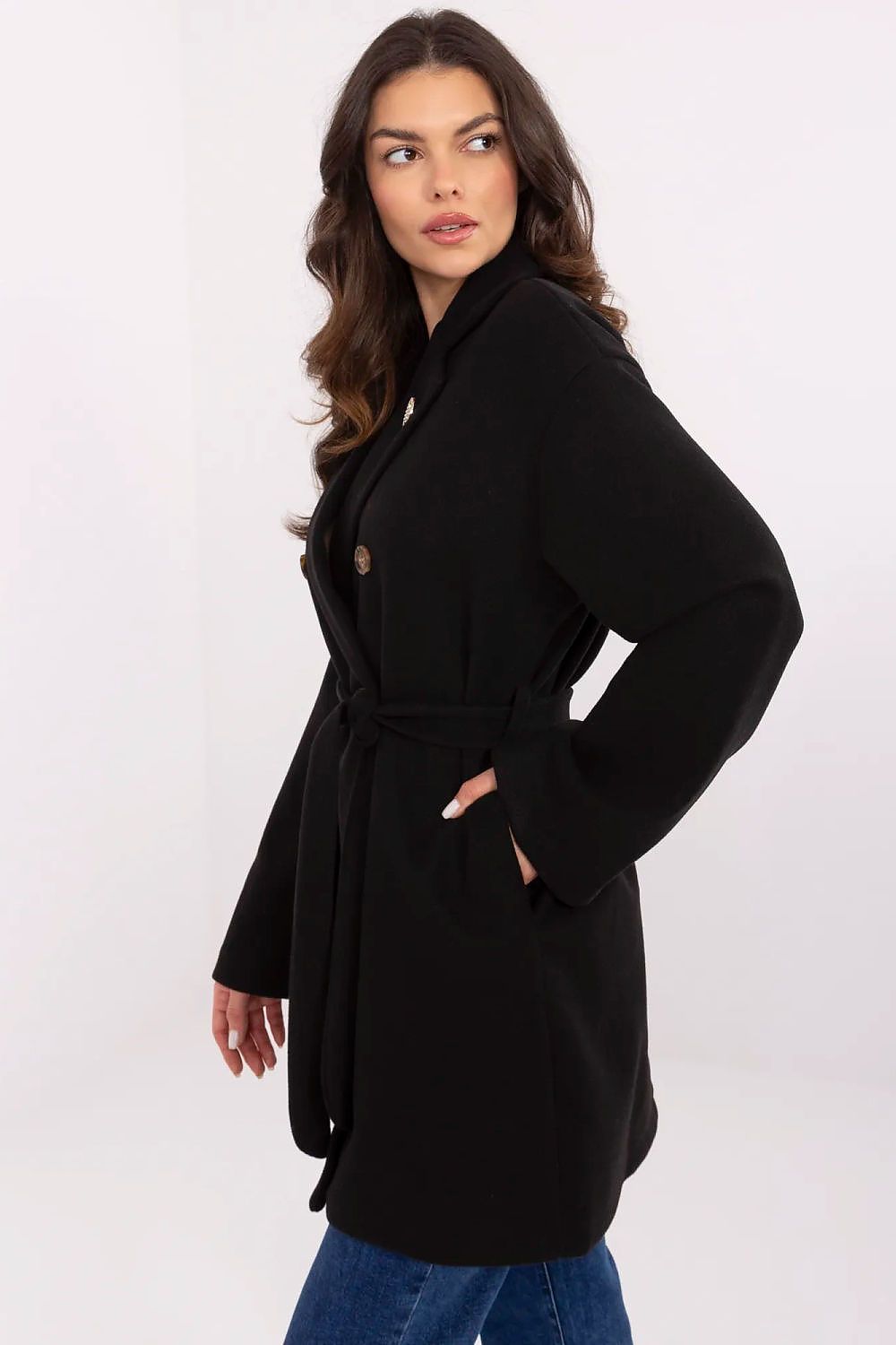 Selvarinne Double-Breasted Short Coat with waist tie and decorative brooch, perfect for transitional wear. Model wearing black coat.