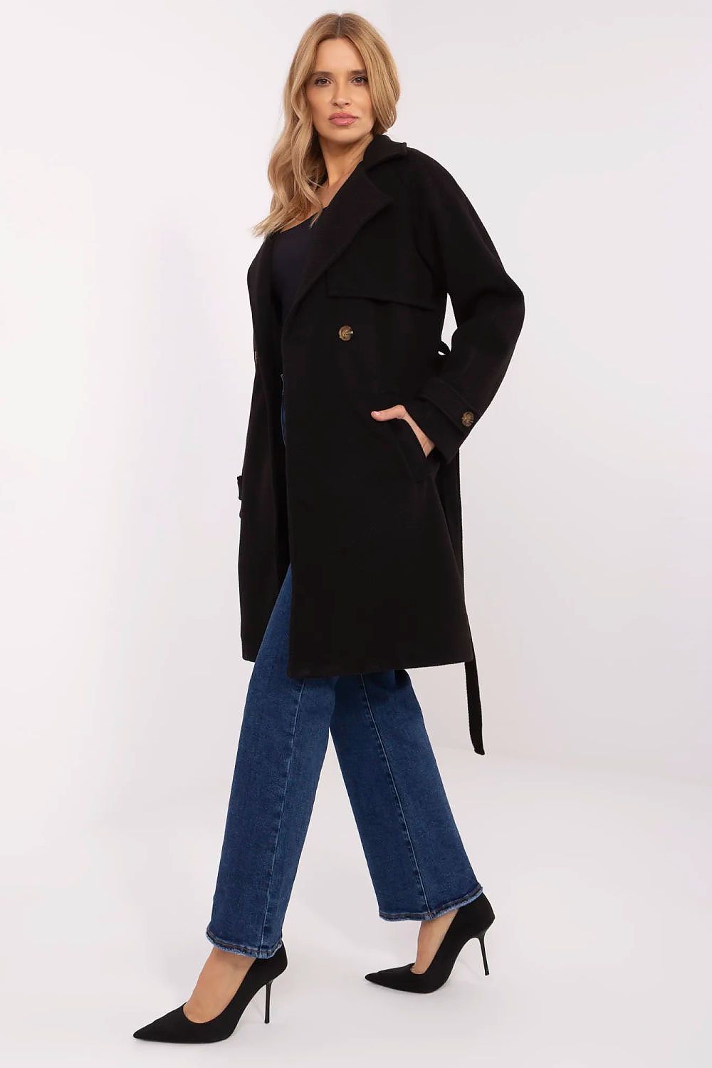 Model wearing Corvanne Double-Breasted Belted Coat, knee-length polyester, stylish for transitional seasons, refined woven stripe fabric.