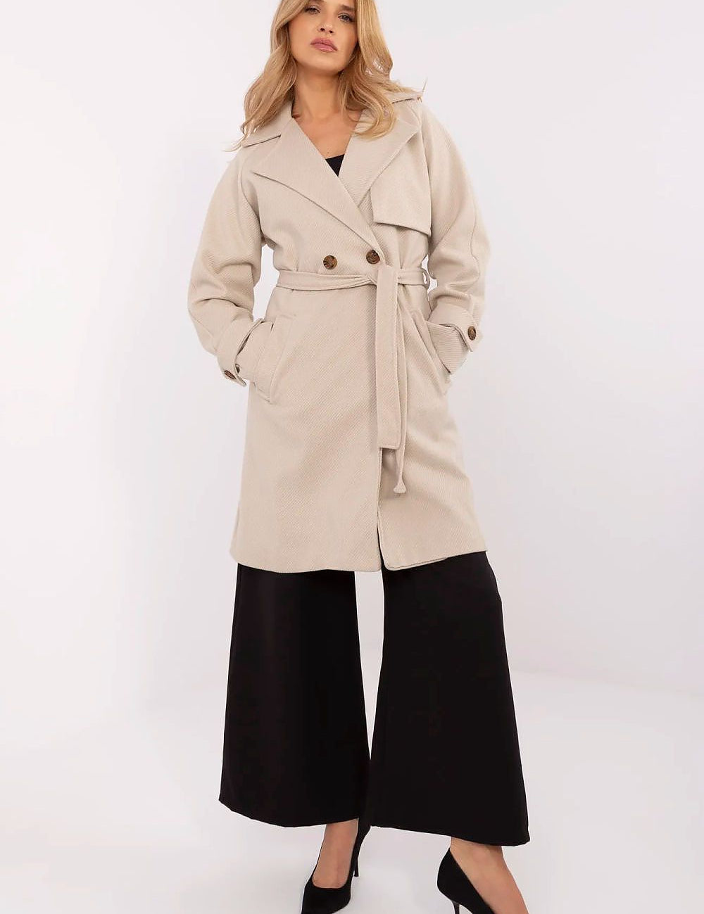 Model wearing Corvanne Double-Breasted Belted Coat with knee-length straight cut and slip pockets, ideal for transitional seasons.
