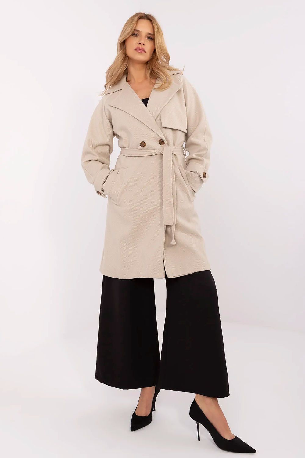 Model wearing Corvanne Double-Breasted Belted Coat with knee-length straight cut and slip pockets, ideal for transitional seasons.
