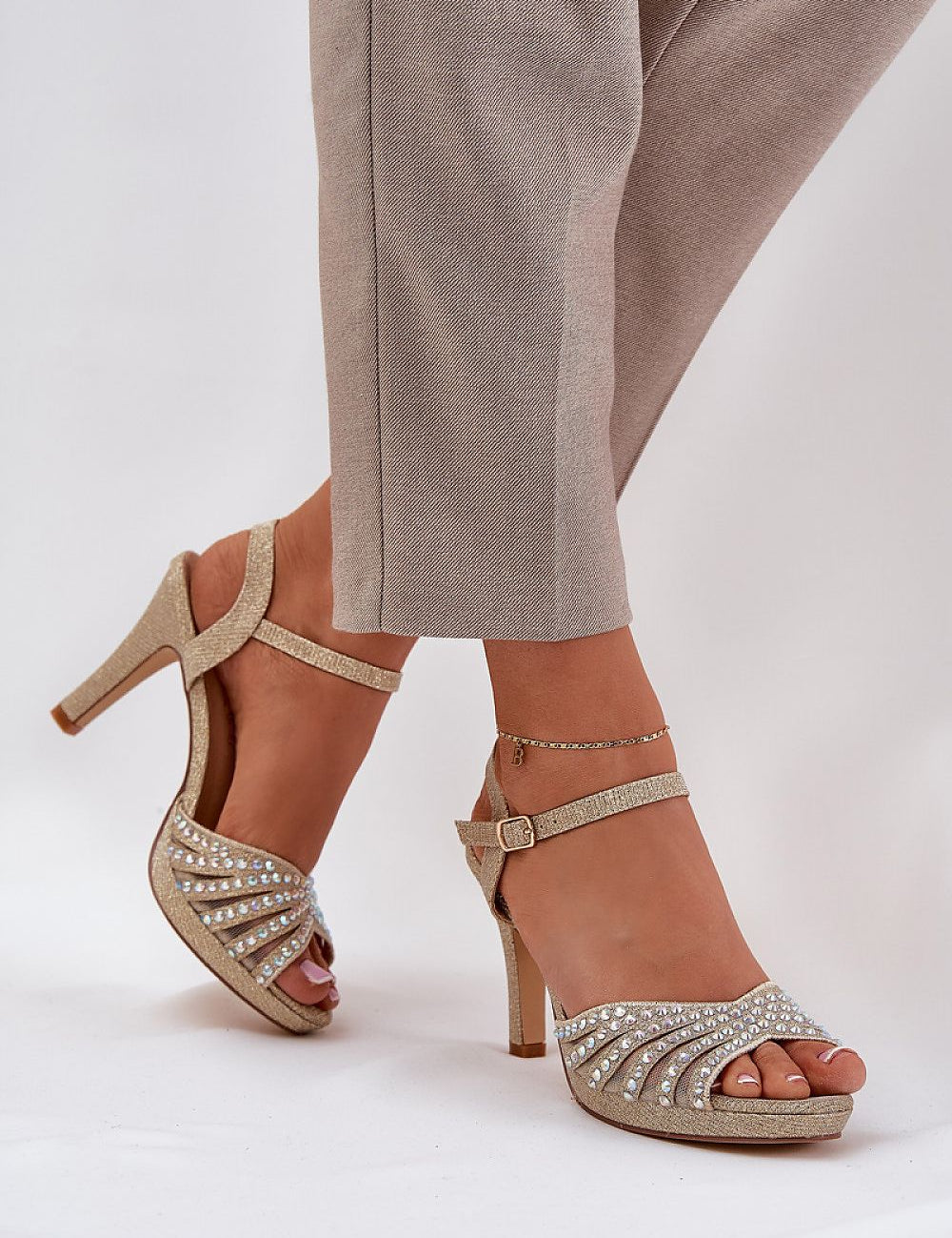 Ravenya Embellished Stiletto Sandals with brocade design and ankle strap, offering elegance and comfort for formal events.