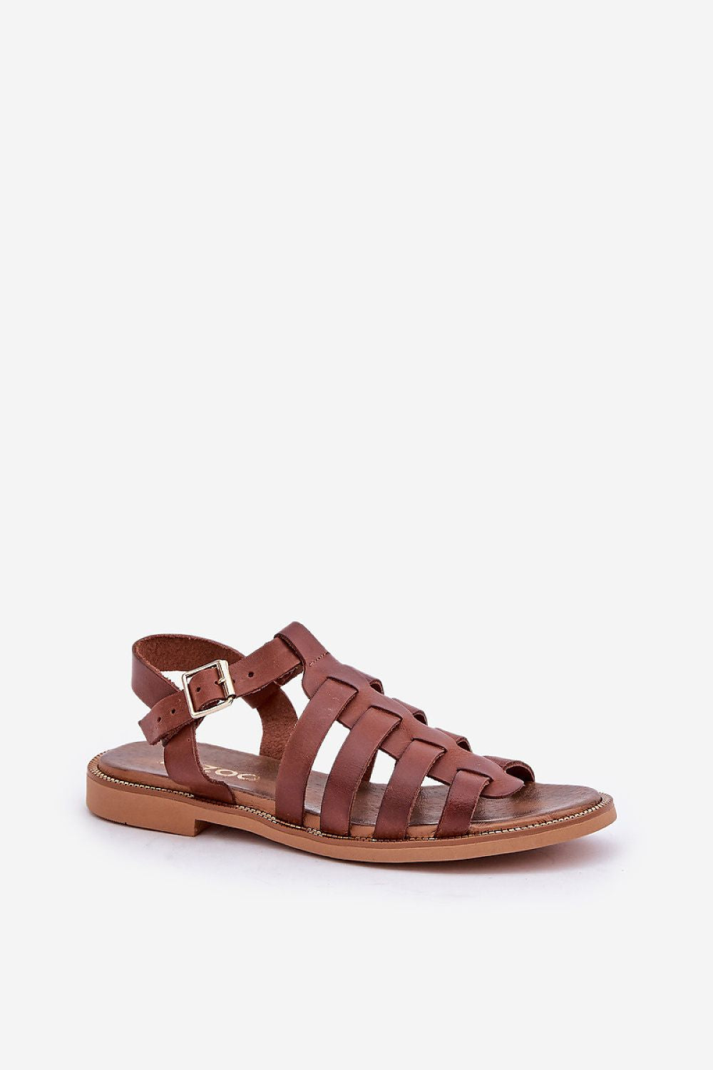 Celira flat leather sandal with buckled ankle strap, ideal for casual and elegant outings. Genuine leather, brown color.