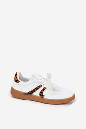 White low-top sneaker with detachable lace and leopard print accents, featuring a brown sole and smooth eco leather design for versatile wear.