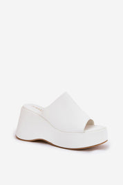 Selentia Faux Leather Wedge Sandals with open-toe and sleek white design, featuring a supportive platform and cushioned interior.