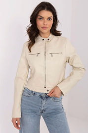 Woman wearing Corvanelle Eco-Leather Zip Jacket with fitted cut, featuring a full-length zip, minimalist design, paired with jeans.