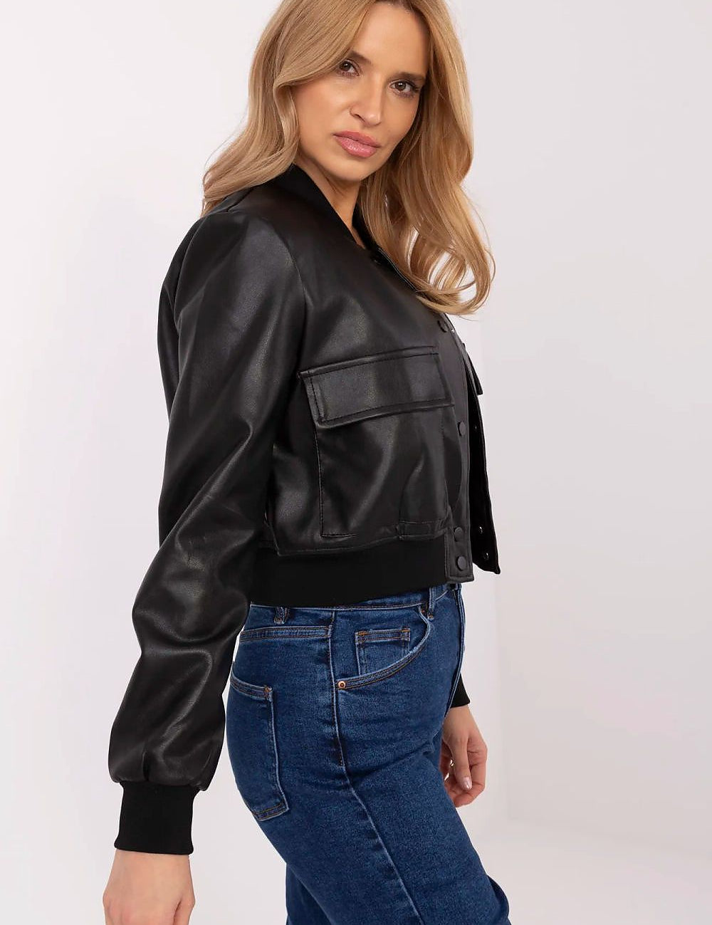 Velvaris eco-leather bomber jacket with snap-button fastening and front flap pockets, showcasing stylish and functional design.