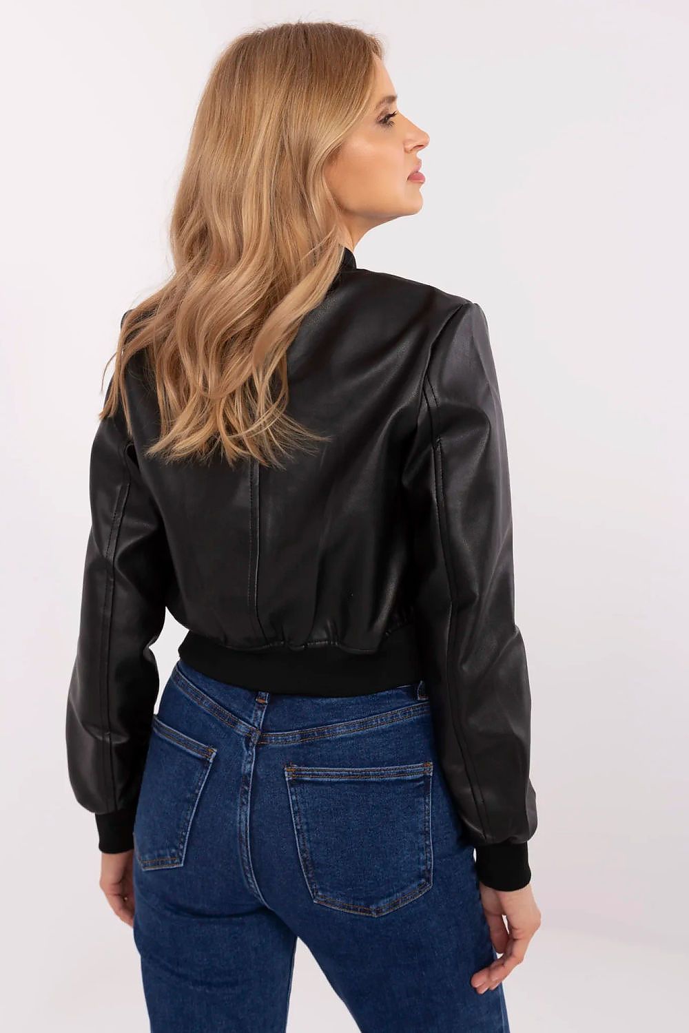 Back view of woman wearing Velvaris Eco-Leather Bomber Jacket, showcasing its classic finish and stylish silhouette.