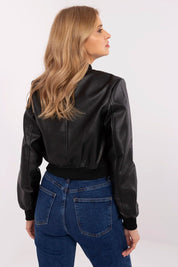 Back view of woman wearing Velvaris Eco-Leather Bomber Jacket, showcasing its classic finish and stylish silhouette.
