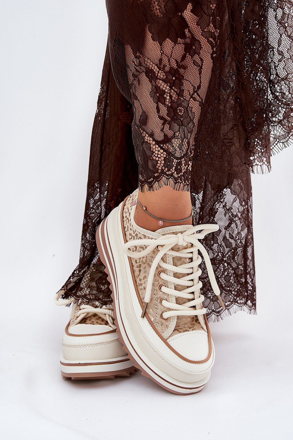 Emlira Thick-Lace Platform Sneakers with textile upper and 6.5 cm platform, styled with lace dress for bold elevation and comfort.