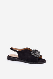 Fiorenna Flat Suede Flower Sandals with sculpted floral accent and cushioned insole, offering romantic charm and all-day comfort.