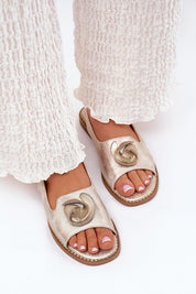 Woman wearing Shiraelle Shimmer Strap Sandals with glossy eco leather and delicate front detail, featuring adjustable ankle strap.
