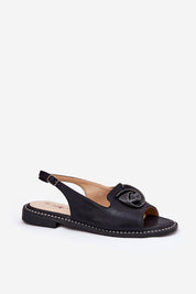 Shiraelle Shimmer Strap Sandals with glossy eco leather and delicate front detail, featuring a 2 cm flat heel and adjustable ankle strap.