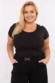 Woman wearing Elvarra Plus Size Cotton Tee in black, showcasing short sleeves and a classic round neckline for effortless style.