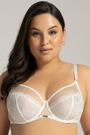 Model wearing Irissia Soft Plus Bra with lace details and seamless design for comfort and support.
