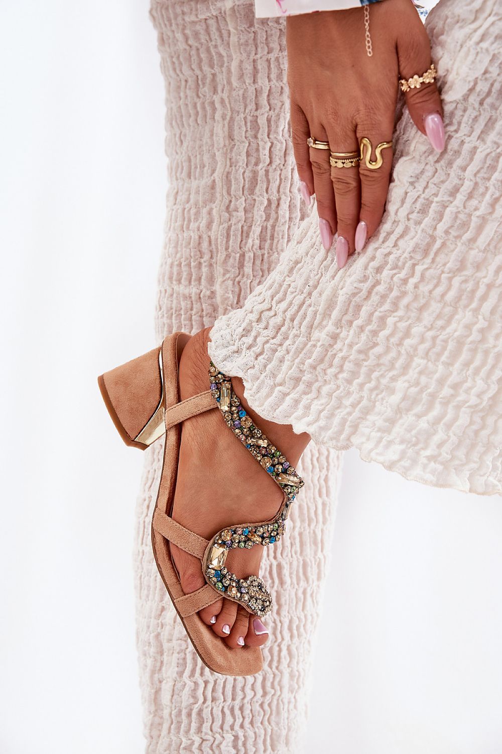 Woman's foot showcasing Orlanza Mirrored Serpent Heel Sandals with crystal serpent design, perfect for elegant ceremonies.