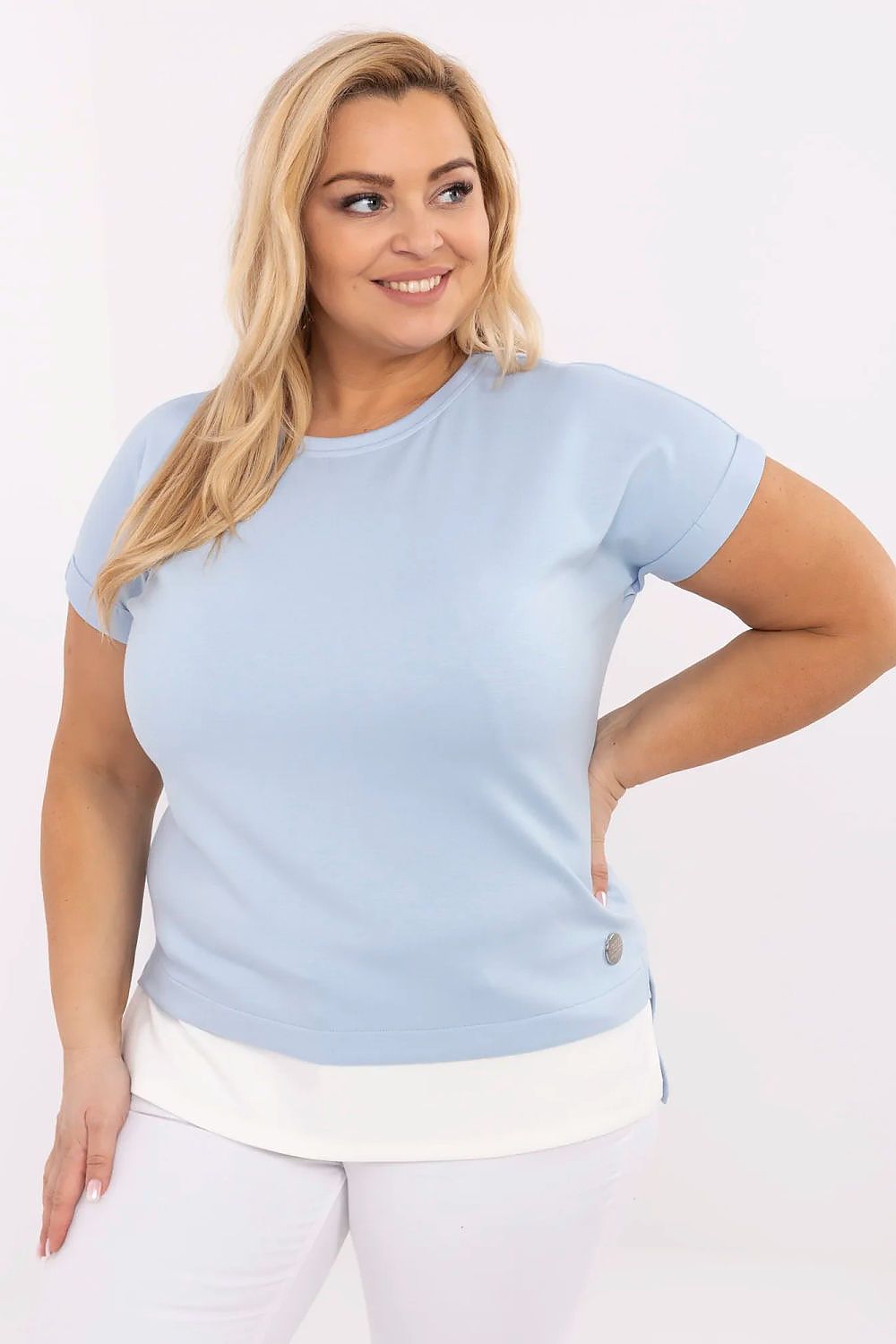Zavelle Plus Size Viscose Blend Blouse in light blue with contrasting hem, worn by model showcasing breathable and stretchy fit.