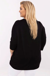 Back view of woman wearing Lioraelle plus size black jet blouse with 3/4 sleeves, showcasing casual elegance and comfort.