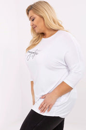 Plus size woman wearing Lioraelle printed jet blouse with 3/4 sleeves, round neckline, showcasing comfort and stylish design.