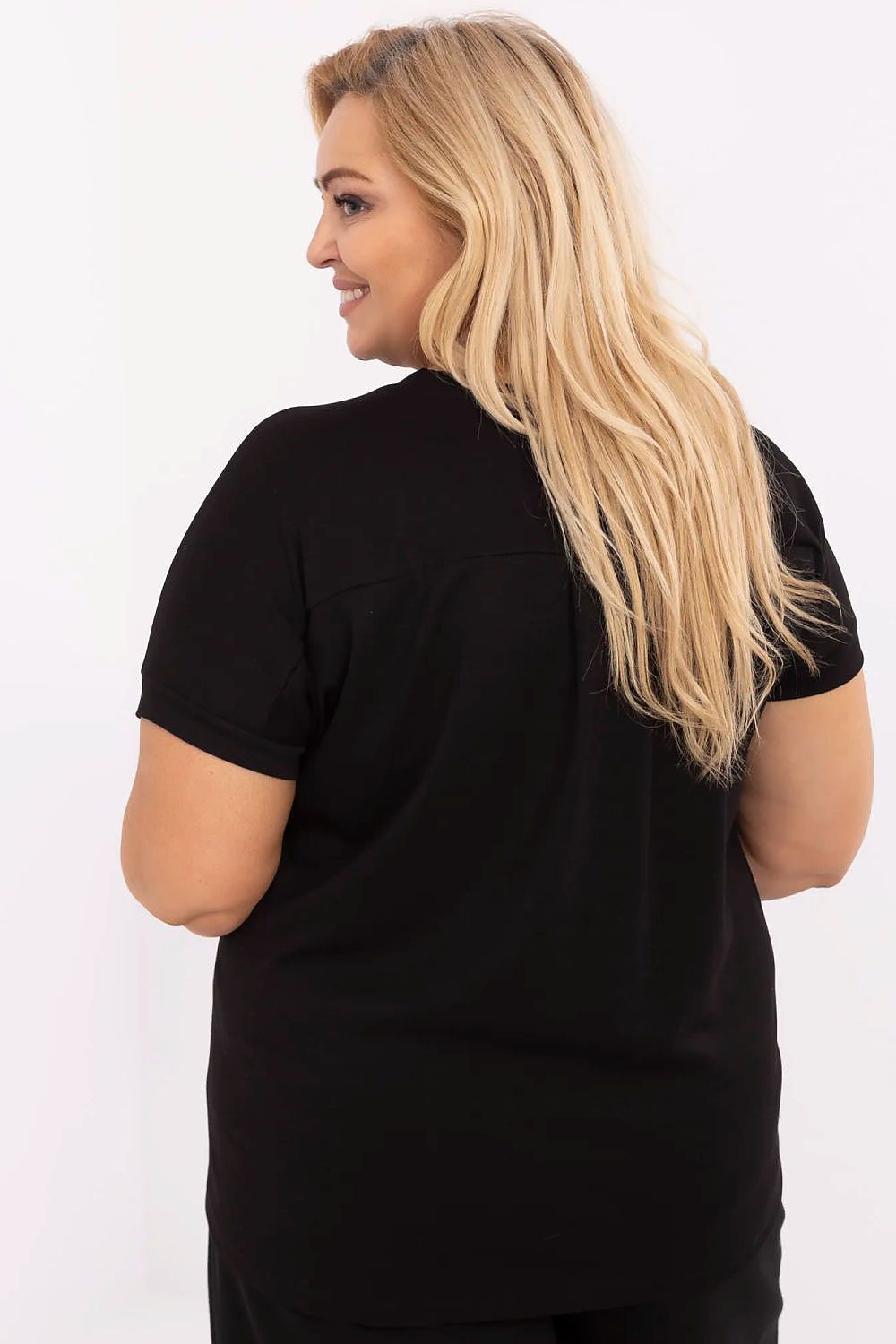 Back view of a woman wearing a black plus size V-neck blouse featuring short sleeves, ideal for layering and elegant everyday wear.
