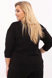Woman wearing plus size Blaire blouse with jet embellishments, back view, three-quarter sleeves, relaxed fit, casual elegance.