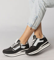 Vorelle Zip-Up Sneakers in black with decorative side zipper, synthetic leather, platform sole, and textile interior for casual comfort.