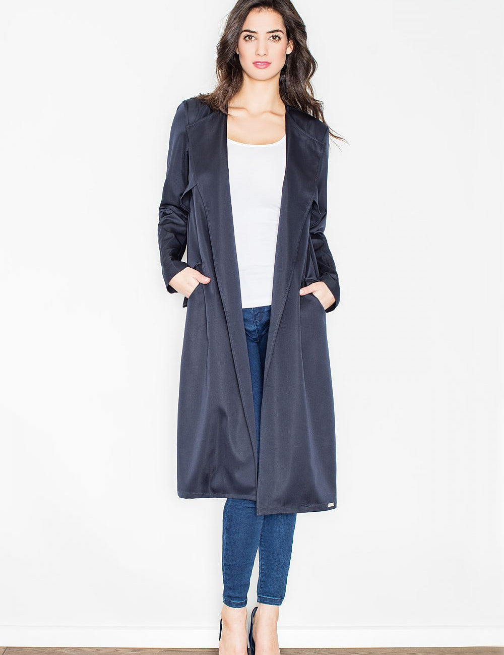Model wearing Selvarra Belted Knit Long Coat with open front, side pockets, cinched waist, combining elegance and comfort.