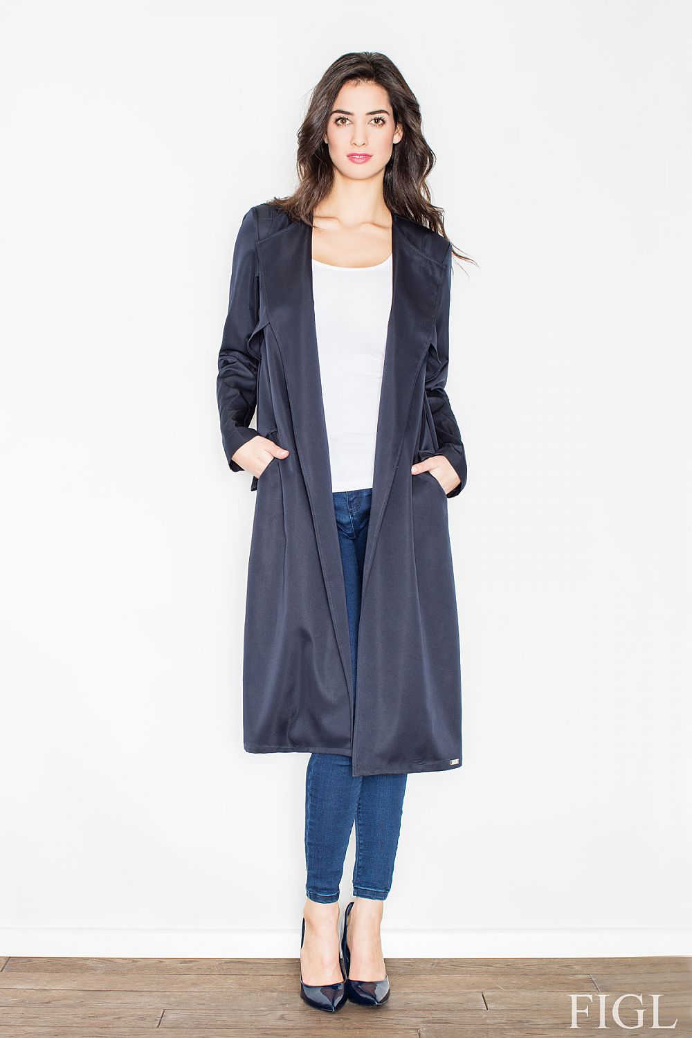 Model wearing Selvarra Belted Knit Long Coat with open front, side pockets, cinched waist, combining elegance and comfort.
