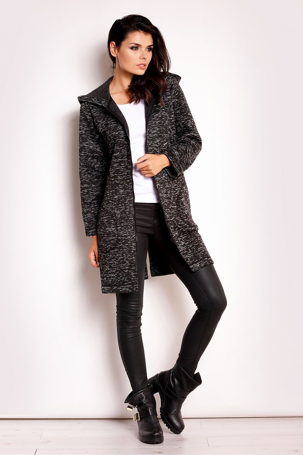 Woman wearing Merivonne Knit Hooded Zip Coat with wide collar, deep pockets, and relaxed fit, showcasing elegant and casual style.