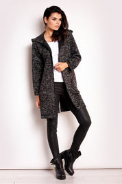 Woman wearing Merivonne Knit Hooded Zip Coat with wide collar, deep pockets, and relaxed fit, showcasing elegant and casual style.