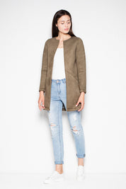 Woman wearing Rovienne open-front coat with topstitching, paired with jeans and white sneakers. Ideal for versatile, everyday style.