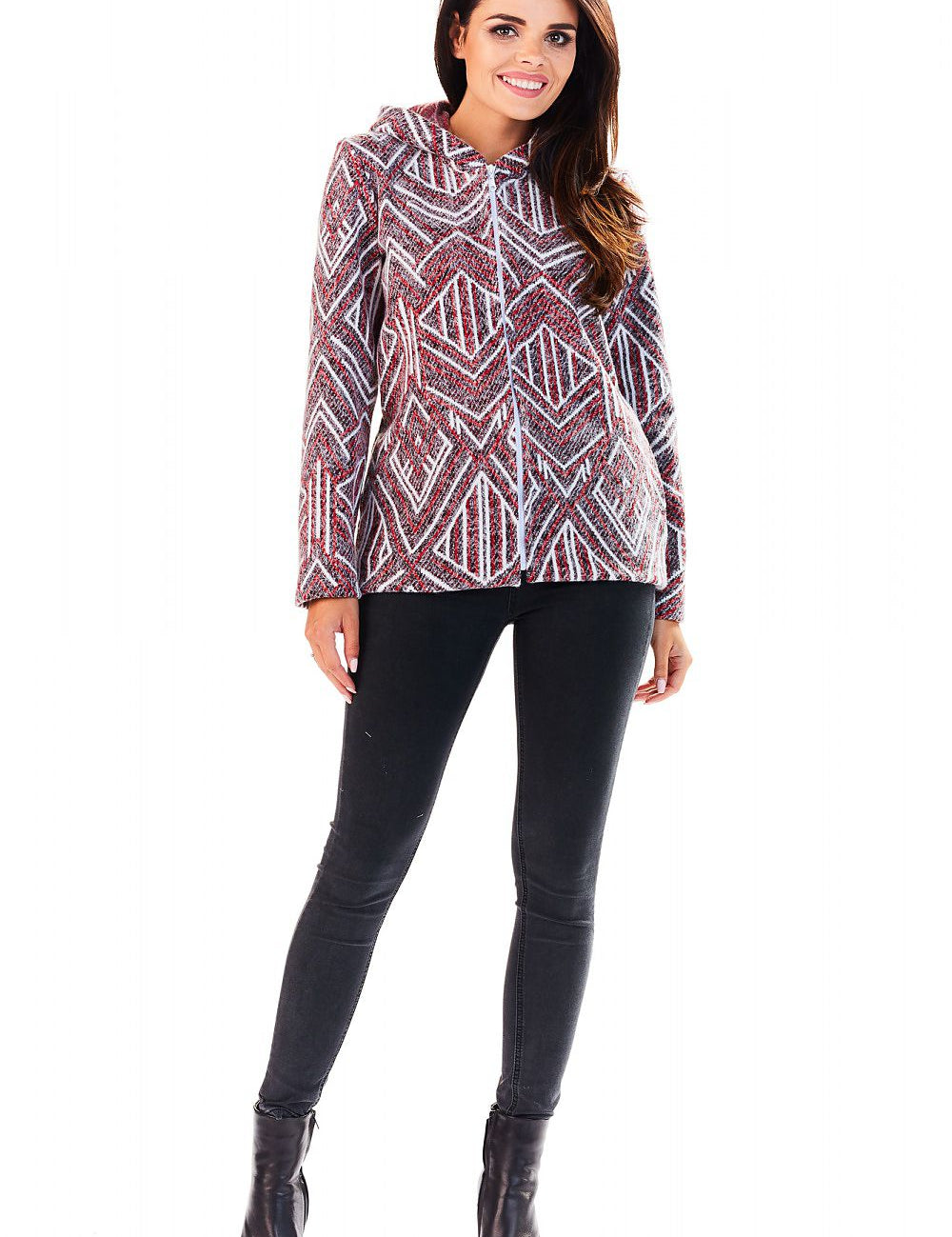 Woman wearing Marquetta Patterned Hooded Jacket with geometric design and full zip, styled with black pants and boots for a casual look.