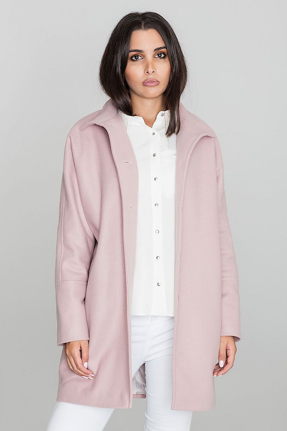 Woman wearing pink Norivelle Kimono-Style Lined Coat with stand-up collar and button fastening.