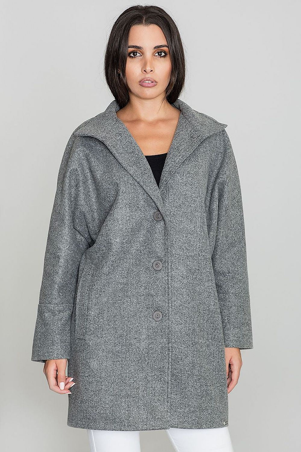 Woman wearing Norivelle Kimono-Style Lined Coat with button fastening and stand-up collar, showcasing elegant design and loose fit.
