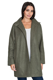 Woman wearing Norivelle Kimono-Style Lined Coat with stand-up collar and button fastening in green, showcasing its elegant design.