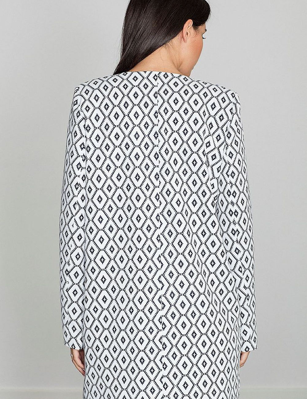 Back view of woman wearing Alverine Viscose-Blend Lightweight Coat with geometric pattern, showcasing elegant, flowing design.