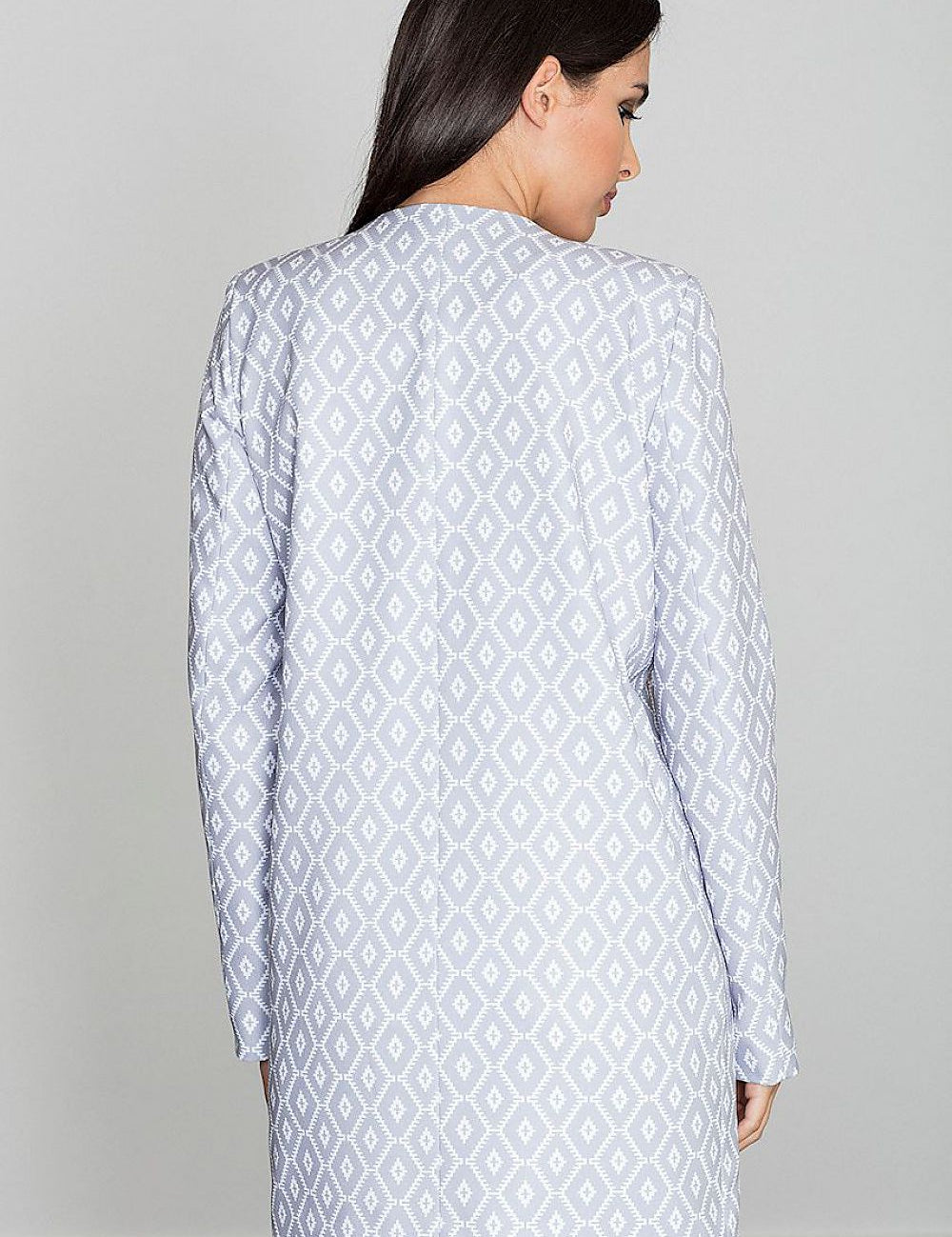 Back view of woman wearing Alverine viscose-blend lightweight coat with geometric pattern, showcasing elegant flow and minimalist design