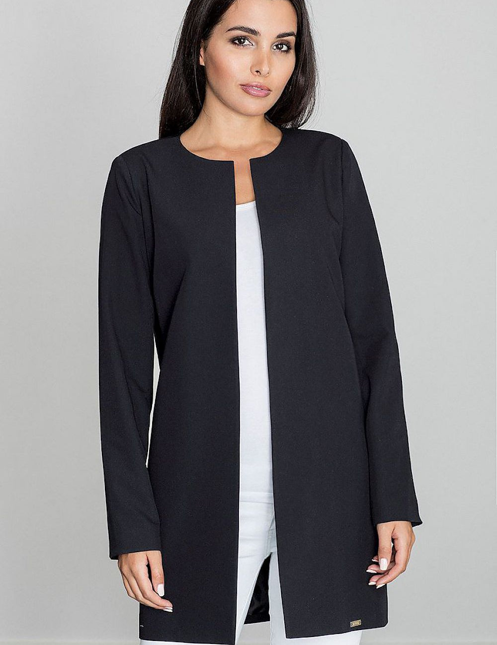 Woman wearing Alverine viscose-blend lightweight coat with straight, flowing cut and minimalist design for elegant styling.