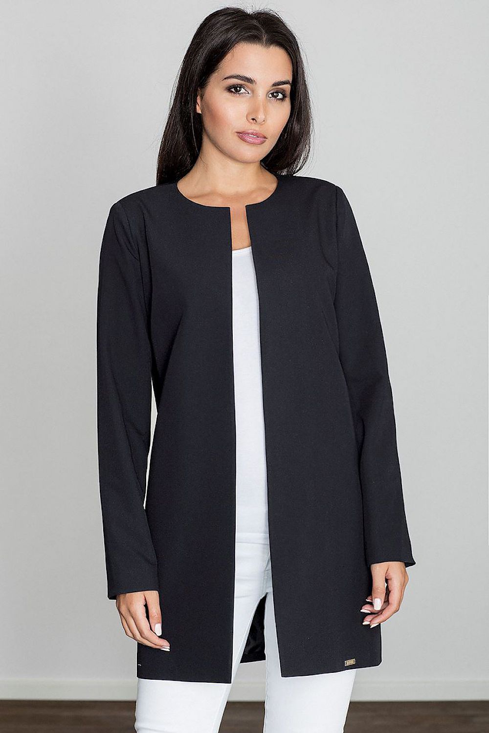 Woman wearing Alverine viscose-blend lightweight coat with straight, flowing cut and minimalist design for elegant styling.