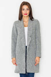 Woman wearing Trevalisse wool-blend knee-length coat with classic straight fit and timeless design, perfect for layering.