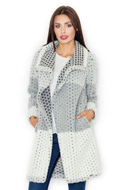 Woman wearing a checkered long wool coat with a classic collar and side pockets, showcasing a modern and stylish autumn fashion look.