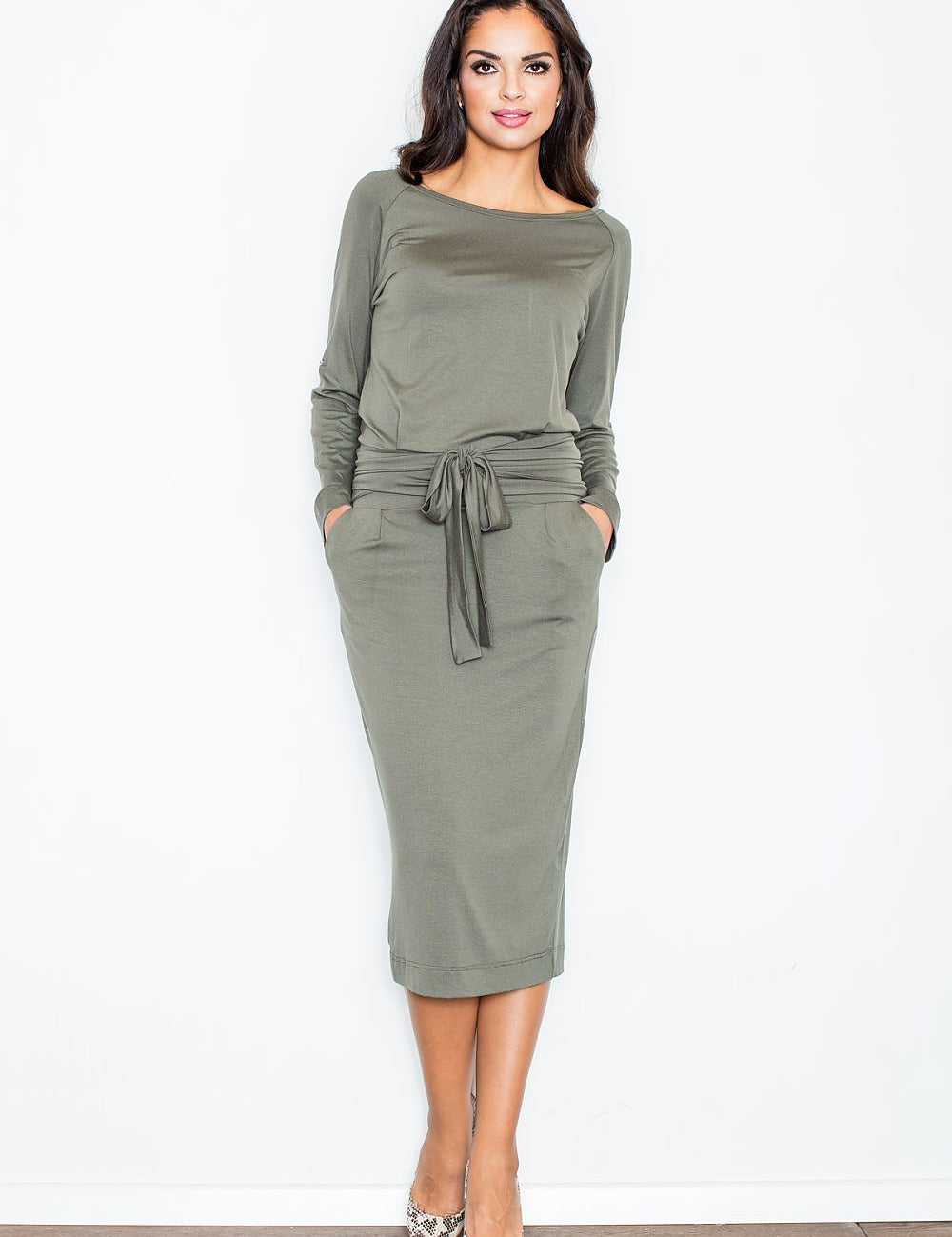 Woman wearing Melira Belted Boatneck Daydress with long sleeves and tie waist, showcasing a chic and comfortable style.