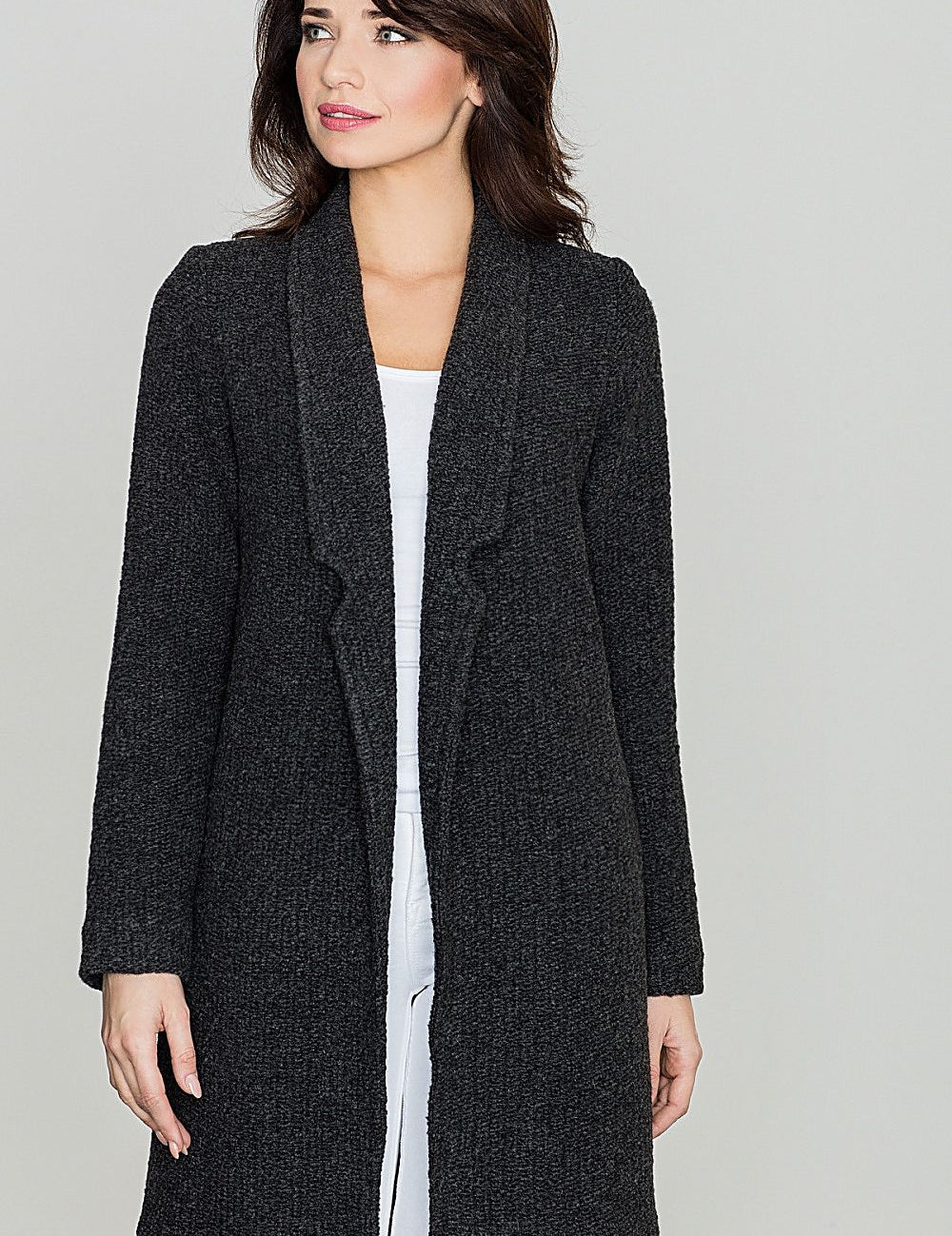 Woman wearing Morvalisse Midi Coat with large collar in dark fabric, showcasing elegant design and comfortable fit.