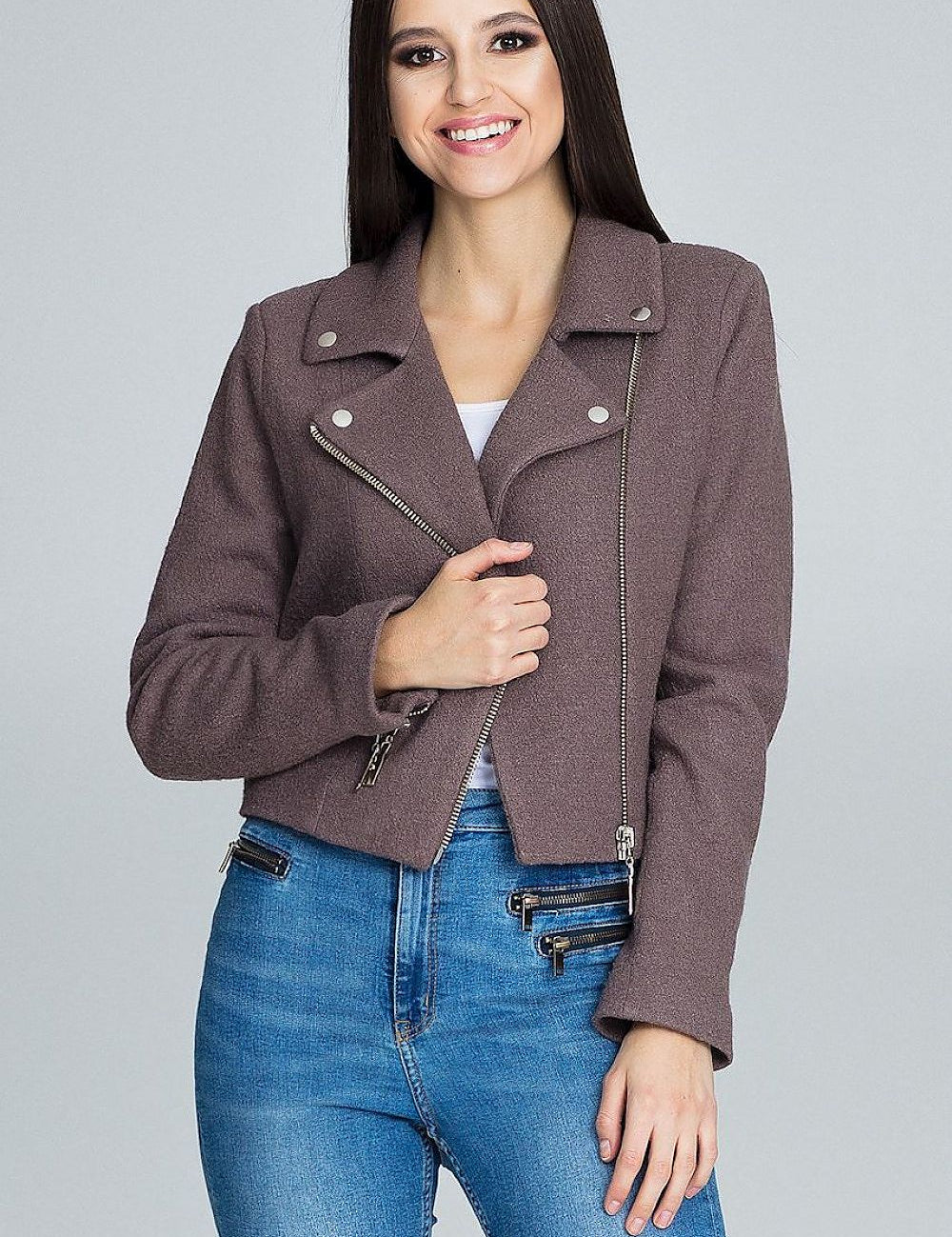 Woman wearing Veylisse Wool-Blend Zippered Ramonesque Jacket with decorative zips, ideal for a modern biker-inspired style.