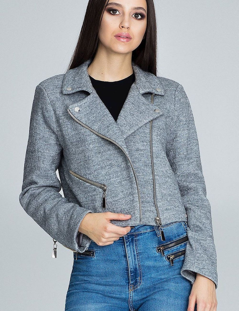 Woman wearing Veylisse Wool-Blend Zippered Ramonesque Jacket, showcasing edgy zipper details and stylish fit.