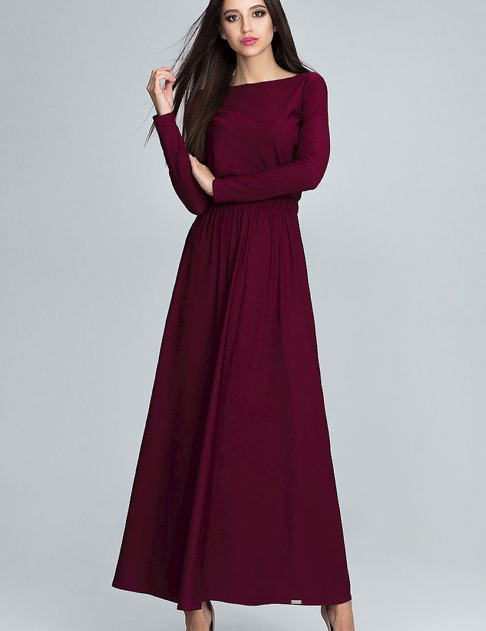 Woman wearing Mariste Long Sleeve Daydress in burgundy, featuring full-length sleeves and a fluid silhouette perfect for versatile styling.